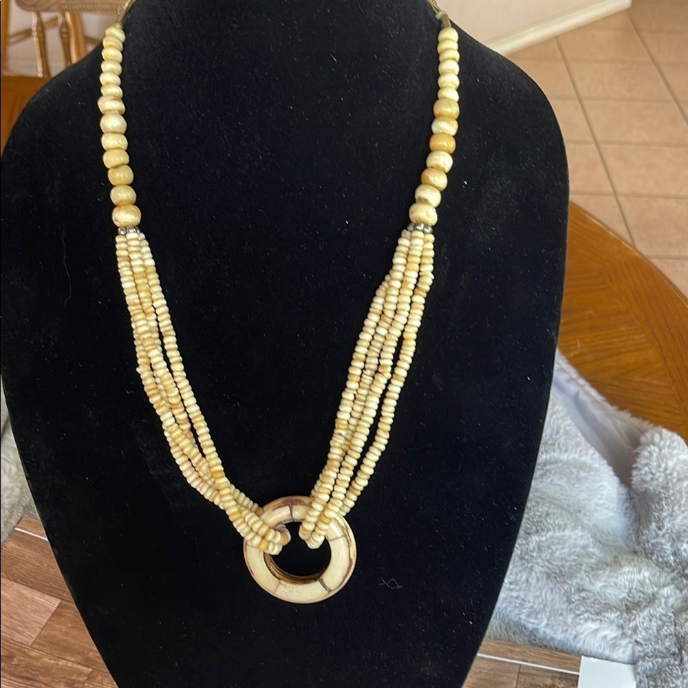 Cream Multi-Strand Beaded Necklace with Pendant